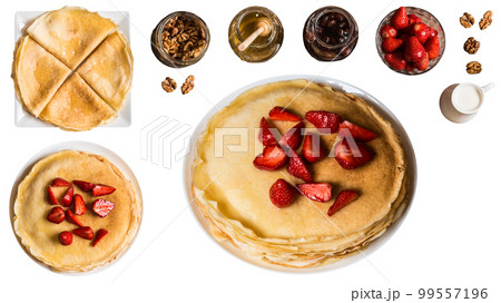 Healthy sweet food pancakes crepes with fruits berries on isolated white background Healthy sweet food pancakes crepes with fruits berries on isolated white background 99557196