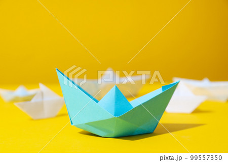 Concept of leadership and business with paper boats 99557350