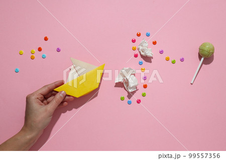 Concept of difficulties on the way to the goal with paper boat Concept of difficulties on the way to the goal with paper boat 99557356