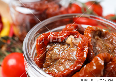 Concept of tasty food - sun-dried tomato 99557398