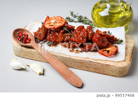 Concept of tasty food - sun-dried tomato 99557406