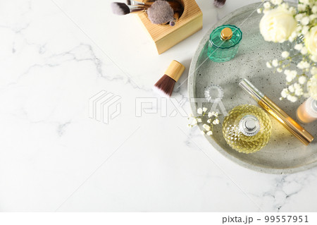 Concept of cosmetic and different female accessories, space for text Concept of cosmetic and different female accessories, space for text 99557951