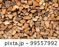 stacked loggs of fire wood 99557992