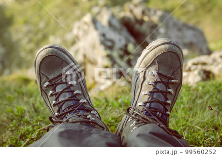 Trekking boots in the mountains 99560252