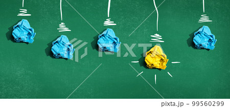 Brainstorming concept with crumpled paper light bulbs 99560299