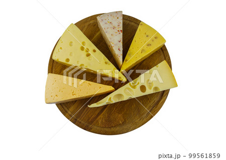 Set of various types of cheese on wooden cutting board isolated on white background. Top view Set of various types of cheese on wooden cutting board isolated on white background. Top view 99561859