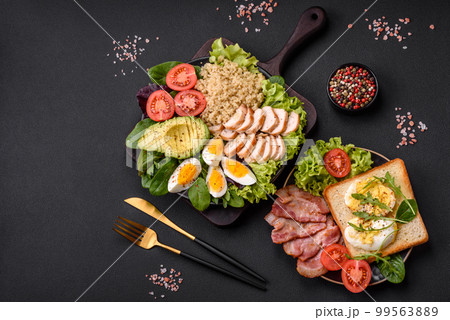 Delicious healthy lunch consisting of chicken, avocado, quinoa, eggs and tomatoes Delicious healthy lunch consisting of chicken, avocado, quinoa, eggs and tomatoes 99563889