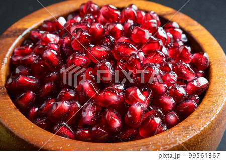 Burning candles on table on black background indoors 99564367