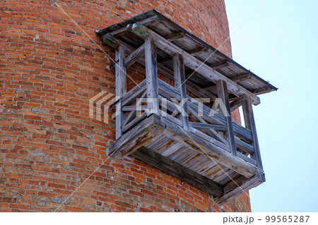 The wooden balcony of the main tower of Turaida walled castle at one of the oldest castles in Latvia. Vidzeme region of Latvia, on the opposite bank of the Gauja river from Sigulda. Gauja National The wooden balcony of the main tower of Turaida walled castle at one of the oldest castles in Latvia. Vidzeme region of Latvia, on the opposite bank of the Gauja river from Sigulda. Gauja National 99565287