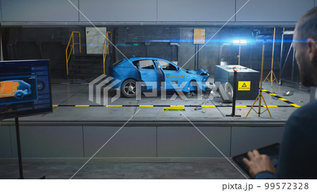 Male engineer simulates traffic accident Male engineer simulates traffic accident 99572328