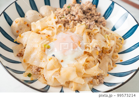 dried spicy noodles with minced pork, meatballs and egg dried spicy noodles with minced pork, meatballs and egg 99573214