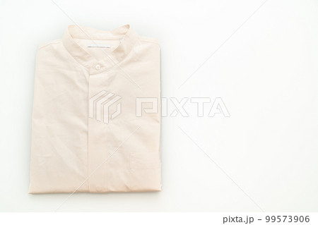 beige shirt fold on white background beige shirt fold on white background 99573906