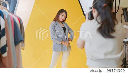 model in photography studio 99574309