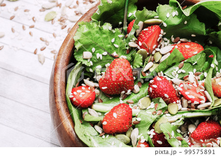 diet summer salad with strawberries, lettuce and seeds, a light snack, healthy food 99575891