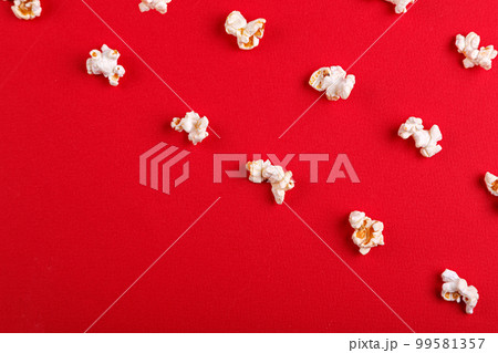 popcorn macro on a red background popcorn macro on a red background 99581357
