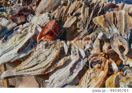Traditional fish-drying on the beach of Nazare, Portugal 99590765