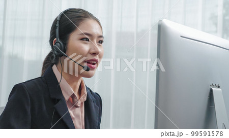 Enthusiastic female operator provide helpful customer service to customer. Enthusiastic female operator provide helpful customer service to customer. 99591578