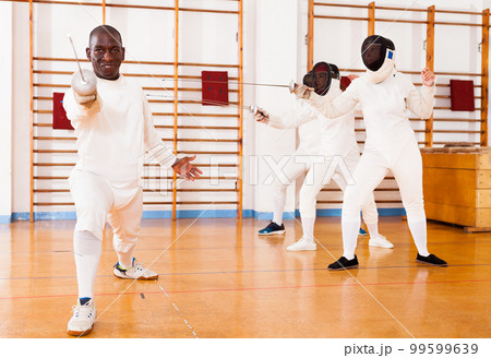 African american man fencer in training room 99599639