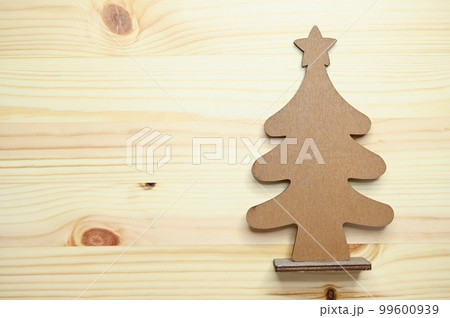 wooden christmas tree on table, celebration design 99600939