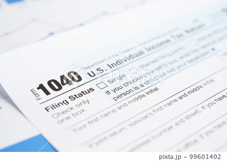 Tax form 1040 U.S. Individual Income Tax Return, business finance concept. Tax form 1040 U.S. Individual Income Tax Return, business finance concept. 99601402