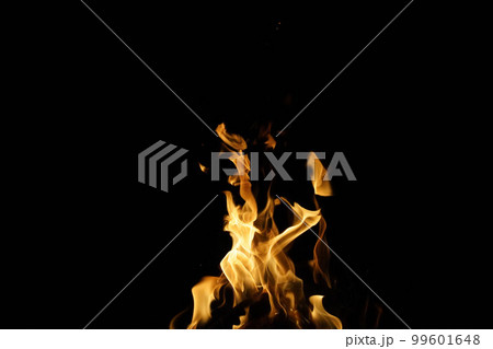 Burning flame or fire isolated on black background. stack of thermal energy close-up, red and yellow, heat energy igniting fuel during night,light on black background. Burning flame or fire isolated on black background. stack of thermal energy close-up, red and yellow, heat energy igniting fuel during night,light on black background. 99601648