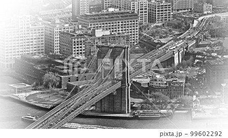 Aerial view over Brooklyn Bridge New York 99602292