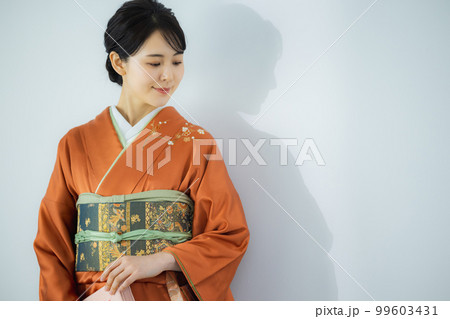 オレンジ色の訪問着 99603431