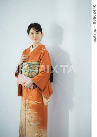 オレンジ色の訪問着 99603440