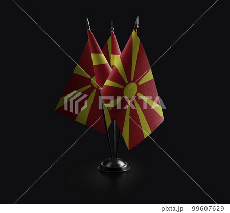 Small national flags of the Macedonia on a black background Small national flags of the Macedonia on a black background 99607629