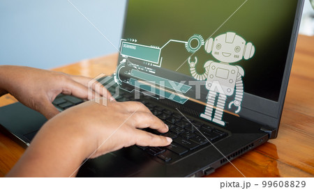 People are working and bringing AI to help them work on computers. People are working and bringing AI to help them work on computers. 99608829