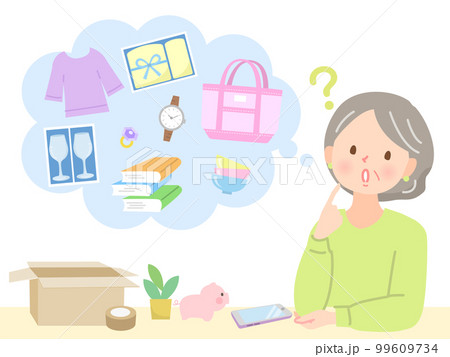 フリーマーケットで販売する商品を考えているミドル女性 99609734