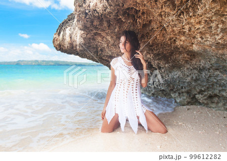 Boho woman on beach Boho woman on beach 99612282