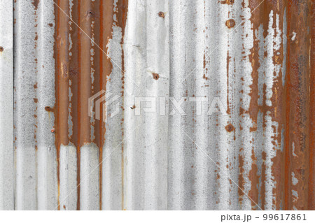The Old zinc texture background, rusty on galvanized metal surface. The Old zinc texture background, rusty on galvanized metal surface. 99617861