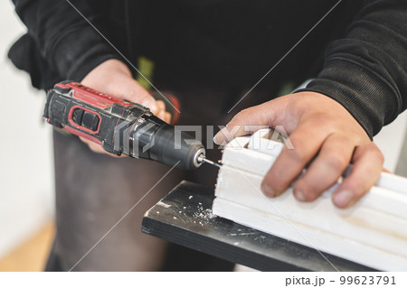 two electric screwdrivers or drills for screwing and drilling 99623791