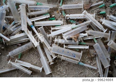 many dirty syringes and needles many dirty syringes and needles 99624664