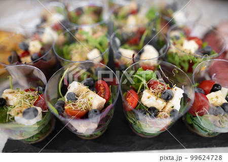 delicious holiday snacks on the table, the food is gourmet. 99624728