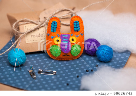 beautiful animal face brooches close up, hand sewn and accessories 99626742