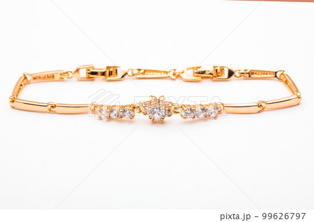 jewelry gold bracelet with precious stones isolated on white background . jewelry gold bracelet with precious stones isolated on white background . 99626797