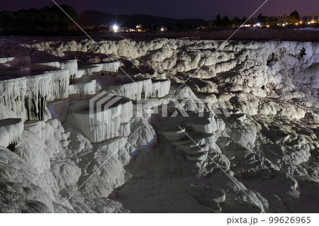 Pamukkale on the top with a view of the city of Denizli at night, Turkey. Pamukkale on the top with a view of the city of Denizli at night, Turkey. 99626965