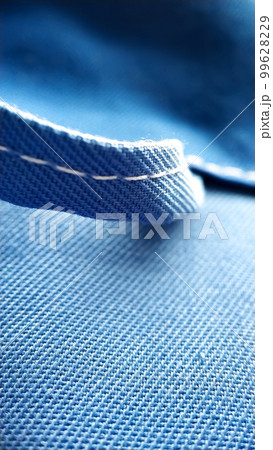 Loop on blue work clothes. workwear close-up macro seam, screed, texture 99628229