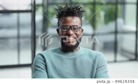 happy young man wondering thinging thoughtful pensive looking guy 99628308