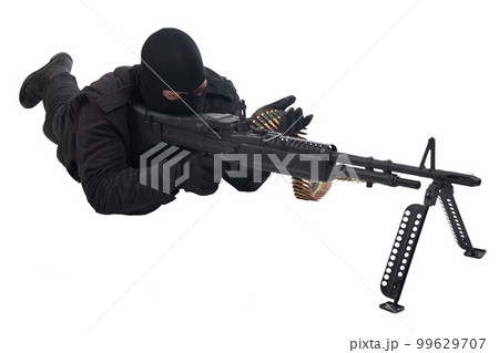 Mercenary in black uniform fire machine gun. Mercenary in black uniform fire machine gun. 99629707