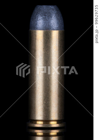.45 caliber round isolated on black with reflexion. .45 caliber round isolated on black with reflexion. 99629735