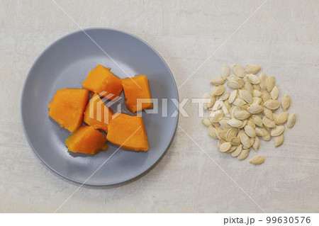 baked pumpkin and pumpkin seeds. Vegetarian lunch baked pumpkin and pumpkin seeds. Vegetarian lunch 99630576