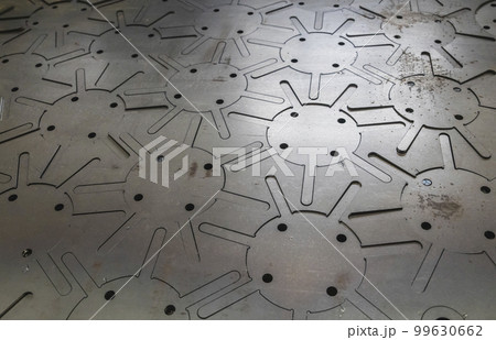 Steel sheet in which parts are laser cut Steel sheet in which parts are laser cut 99630662