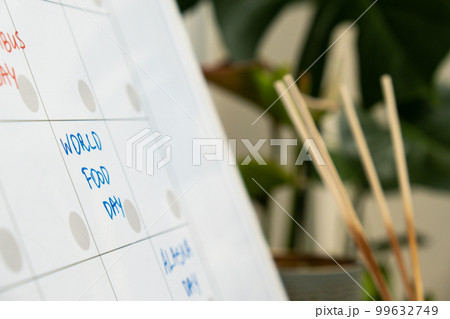 WORLD FOOD DAY on calendar to remind important event appointment Monthly PLANNER. Magnetic board with the days of the month. Place to enter important matters schedule. Concept for business planning 99632749