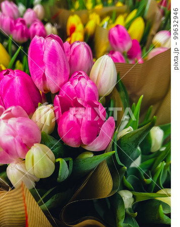 Set of bouquets of tulips of different colors, tulips bouquet. Present for March 8, International Women's Day. Holiday decor with flowers selling. Bouquet with colorful tulips. Holiday floral decor 99632946
