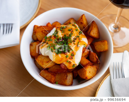 Spanish fried potatoes patatas bravas Spanish fried potatoes patatas bravas 99636694