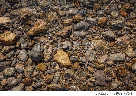 Rocky shapes on the beach. textures and patterns generated on the stones of the Ibiza. 99637752