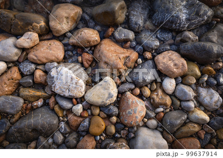 Rocky shapes on the beach. textures and patterns generated on the stones of the Ibiza. 99637914